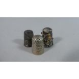 Three Silver Thimbles