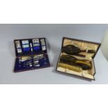 A Cased Edwardian Ladies Sewing Sewing Set Together with a Faux Tortoiseshell Dressing Table Set