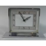 A Bentima Art Deco Chrome Cased Desk Top Clock with Eight Day Movement, 20cms Wide