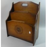 A Mid 20th Century Two Division Oak Magazine Rack with Carved Rose Decoration, 47cms High