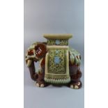 An Indian Glazed Ceramic Seat in the Form of an Elephant, Brown, Green and Blue Enamels, 52cms Long