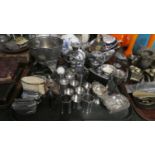 A Tray of Silverplate to Include Table Lighters, Candelabra, Hip Flask, Spirit Measures, Tea