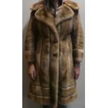 A Ladies Three Quarter Length Fur Coat by Smith of Cheltenham