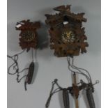 Two Mid 20th Century Black Forest Cuckoo Clocks, the Smaller Missing Pendulum