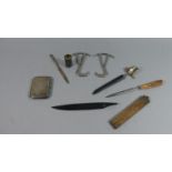 A Collection of Curios to Include Cigarette Case, Pair of Boot Pulls, Folding Carpenters Ruler,