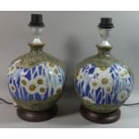 A Pair of Ceramic Globular Table Lamps decorated with Flowers, Each 38cms High