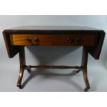 A Reproduction Drop Leaf Mahogany Coffee Table with Two Drawers, 71cms Wide when Closed