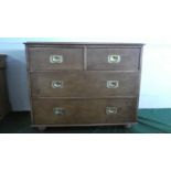 A Reproduction Oak Campaign Style Chest of Two Short and Two Long Drawers with Inset Brass