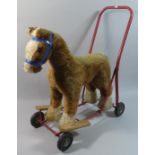 A Vintage Pedigree Push Along Horse Toy