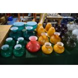 A Large Collection of Coloured Glass Light Shades