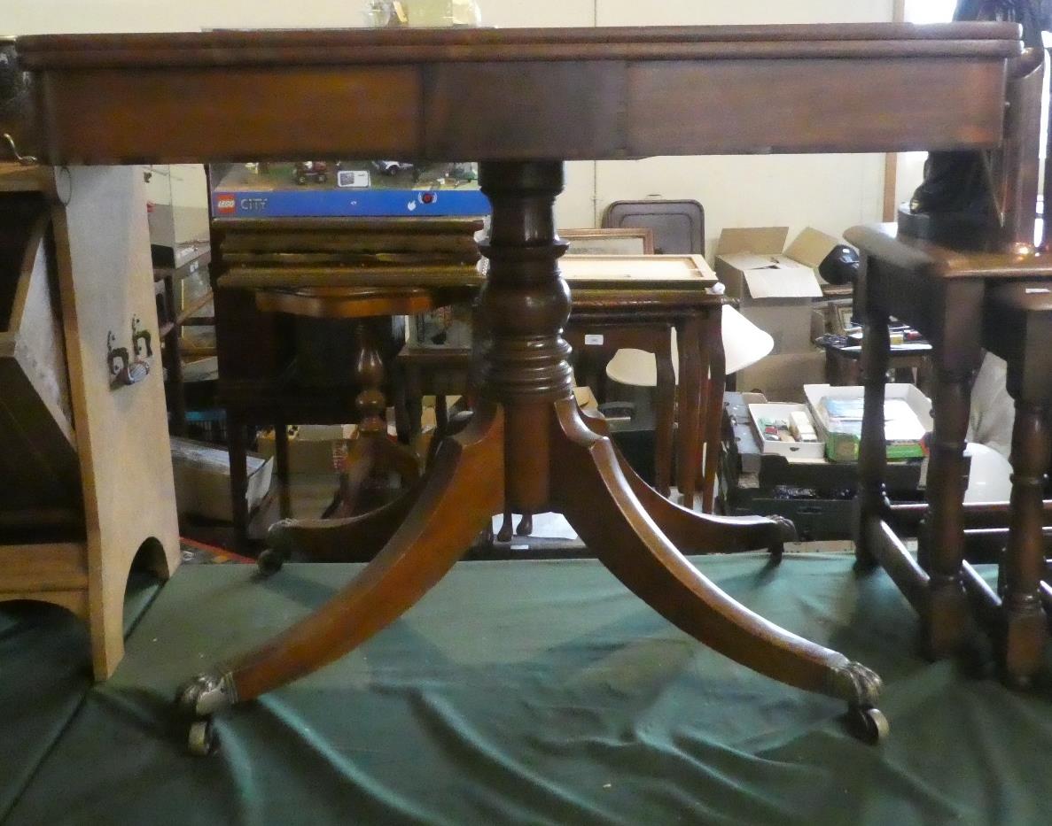 A Mid 19th Century Mahogany Lift and Twist Tea Table on Turned Support with Quadrant Base Having a