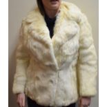 A Ladies Vintage White Fur Jacket