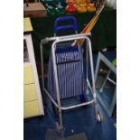 A Invalid Walking Aid, Shopping Trolley, Umbrella and Two Walking Sticks