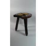 A Stained Wooden Horseshoe Shaped Stool with Three Legs and Animal Skin Panel, 36cm Long