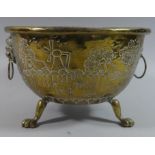 A Hand Beaten Dutch Brass Two Handled Bowl on Three Claw Feet, the Body Decorated with Windmill