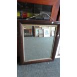 A Mahogany Cushion Framed Wall Mirror, 65cm High