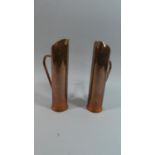 A Pair of Copper Jugs, 22.5cm High