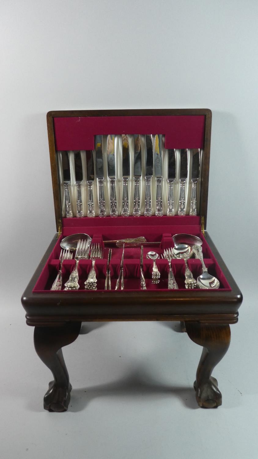 A Modern Mahogany Cased Canteen of Kings Pattern Stainless Steel Cutlery on Short Cabriole