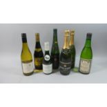 A Collection of Seven Bottles of White and Sparkling Wines