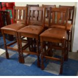 A Set of Six Hide Upholstered Bar Stools