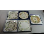 A Collection of Four Wedgwood Calendar Plates and a Royal Worcester Arcadia Cake Plate