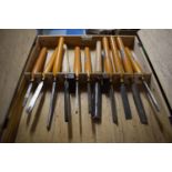 A Wall Mounting Cabinet Housing Set of Eleven Solby and Other Turning Wood Chisels