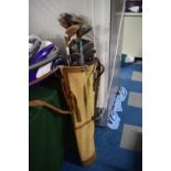 Two Canvas Golf Bags Containing Vintage Golf Clubs with Metal and Wooden Shafts
