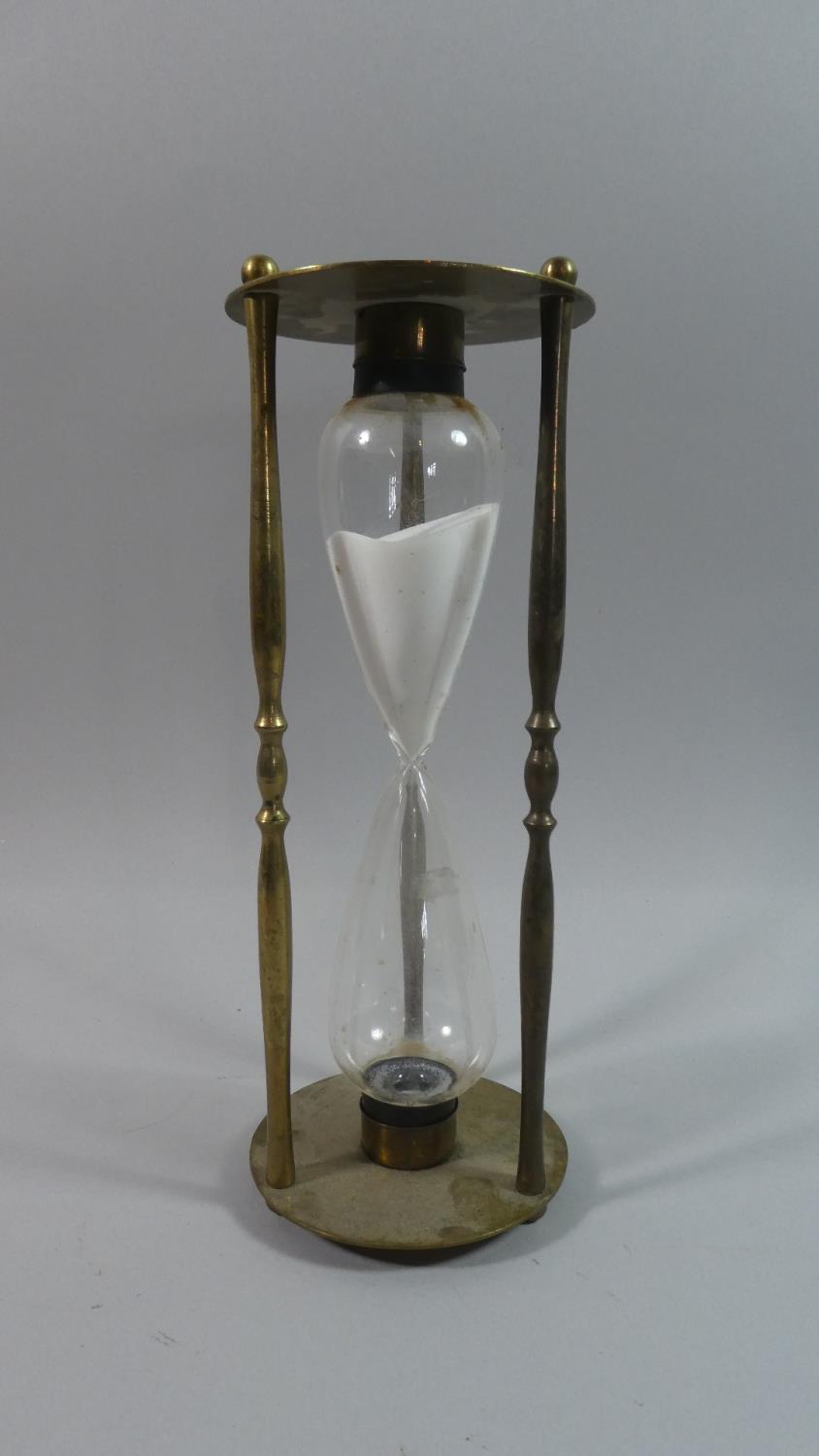 A Modern Brass Hour Glass, 27cm High