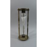 A Modern Brass Hour Glass, 27cm High