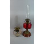 Two Late 19th Century Oil Lamps with Glass Reservoirs and Duplex Controls, Complete with Chimneys