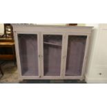 A Painted Glazed Three Section Display Cabinet or Bookcase, 145cm Wide