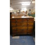 A Victorian Mahogany Bedroom Chest of Two Short and Three Long Drawers with Turned Wooden Handles.