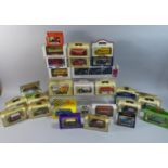 A Collection of 28 Boxed Vans, Buses, Trucks, Matchbox, Maisto, Days Gone Etc
