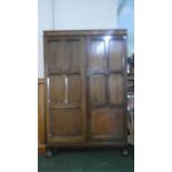 An Edwardian Oak Fitted Cabinet with Panelled Doors, 84.5cm Wide