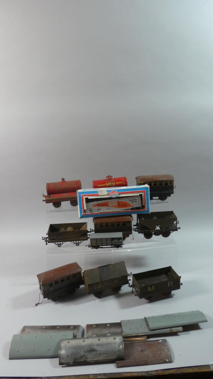 A Collection of Nine O Gauge Wagons and Coaches by Hornby, MLLD England, to include Coal, Cement,