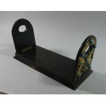 A Victorian Ebonised and Brass Mounted Book Slide with Turquoise Style Mounts