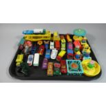 A Small Collection of Playworn Die-Cast Toys and Plastic Fisher Price Dolls House Furniture