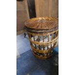 A Cylindrical Wicker Clothes Basket with Lid, 45cm Diameter