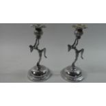 A Pair of Art Deco Chromed Figural Candle Sticks with Supports in the Form of Nude Maidens, 21.5cm