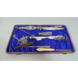 A Collection of Curios to Include Silver Plated Letter Opener, Butter Knife, Manicure Tools,