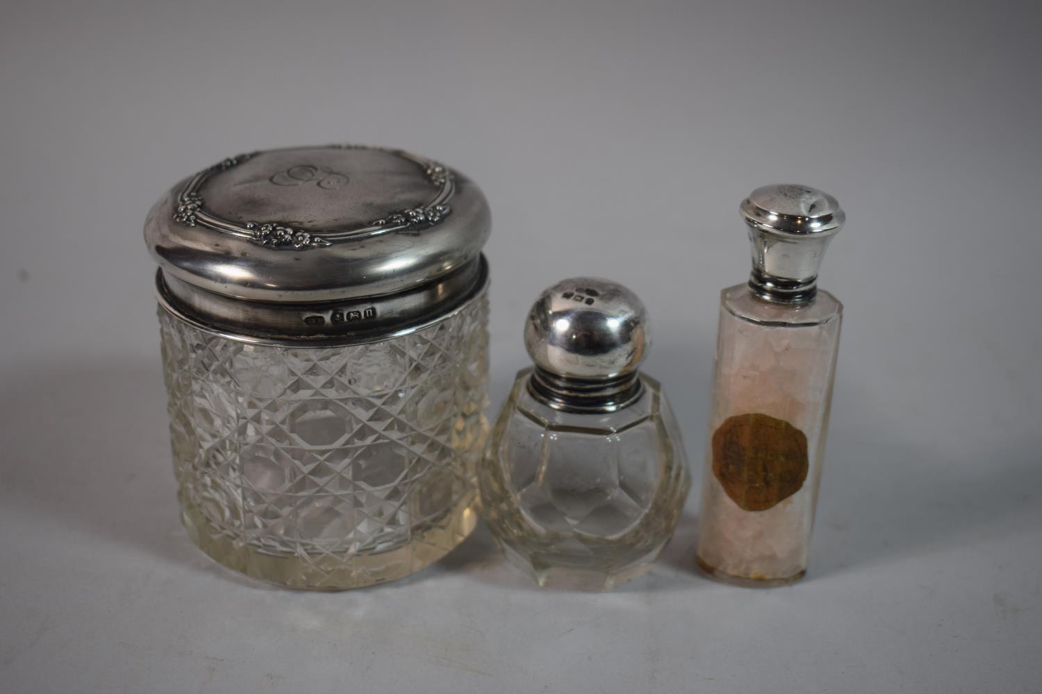 Three Silver Topped Glass Dressing Table Pots