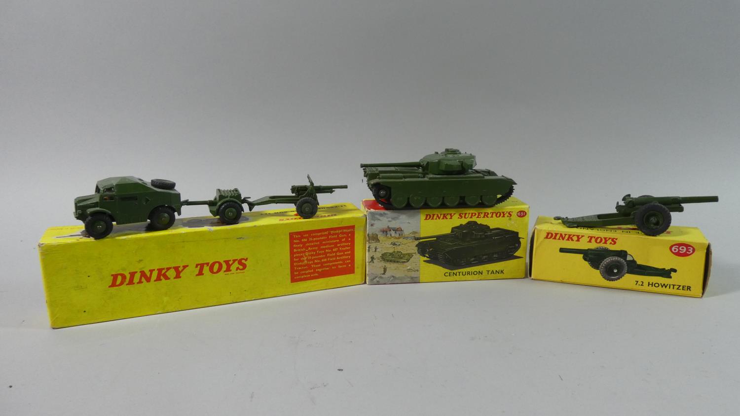Three Boxed Military Dinky Toys. 25-Pounder Field Gun Set No 697, 7.2 Howitzer No 693 and