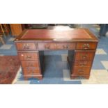 A Modern Serpentine Fronted Mahogany Kneehole Desk with Red Tooled Leather Writing Surface, 120cm