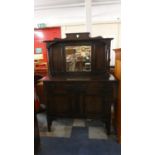 An Edwardian Oak Mirror Backed Sideboard with Two Drawers Over Cupboard, 121cm Wide