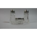 A Silver Mounted Three Piece Glass Cruet Set