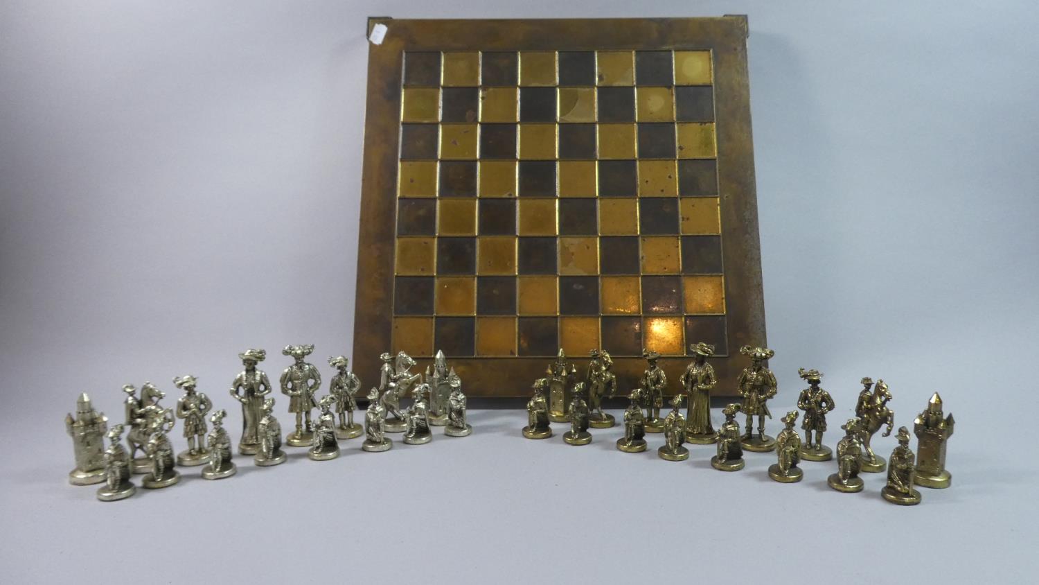 A Mid 20th Century Brass Chess Board and Chess Set, 44cm Square