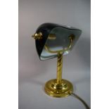 A Reproduction Brass and Opaque Green Glass Desk Top Lamp, 31cm High