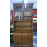 A Yew Wood Side Unit with Astragal Top Section with Centre Shelves and Cupboard Base, 95cm Wide