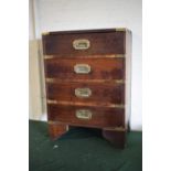 A Reproduction Campaign Style Four Drawer Brass Mounted Chest with Tooled Leather Writing Surface,