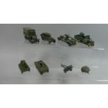 A Collection of Eight Unboxed Dinky Military Vehicles comprising Tanks, Armoured Trucks, Guns Etc